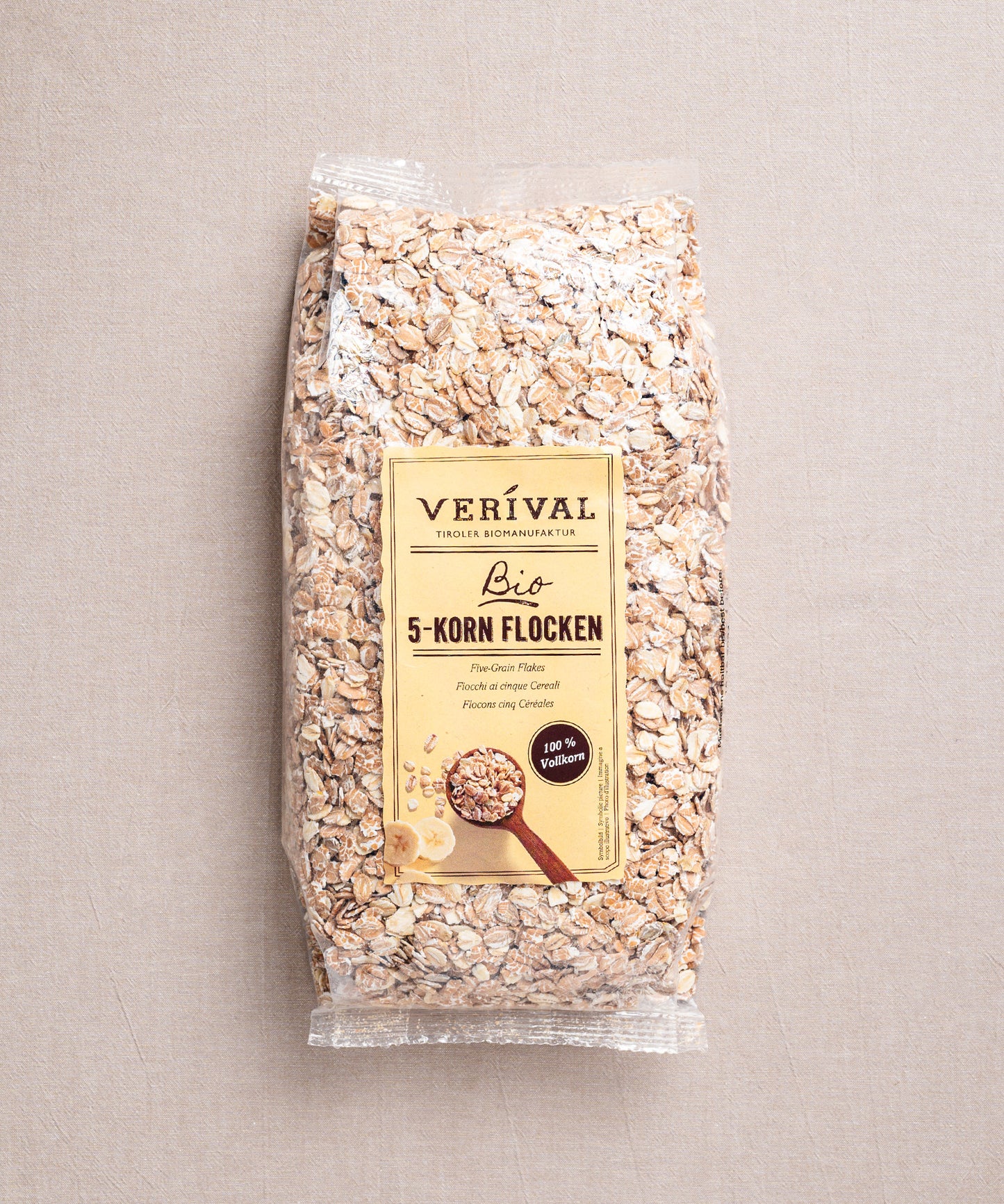 Die 5-Korn Flocken von Verival Bio sind eine nahrhafte Frühstücksmischung mit Bio-Vollkorn. Das beigefarbene Etikett unterstreicht den hohen Gehalt an pflanzlichem Protein.
